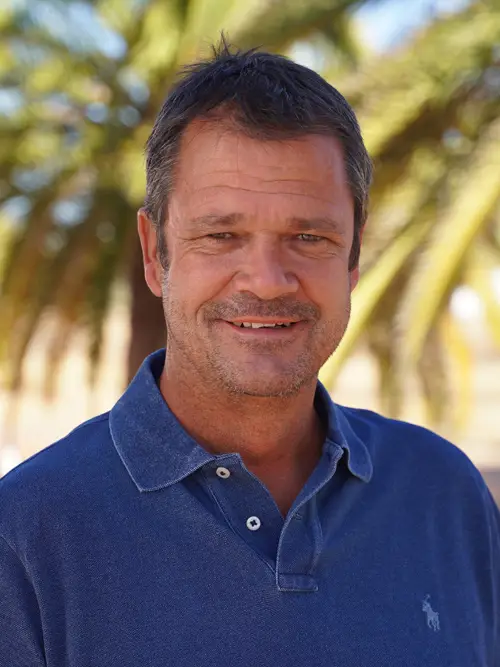 Portrait of Paul Stommel smiling outdoors