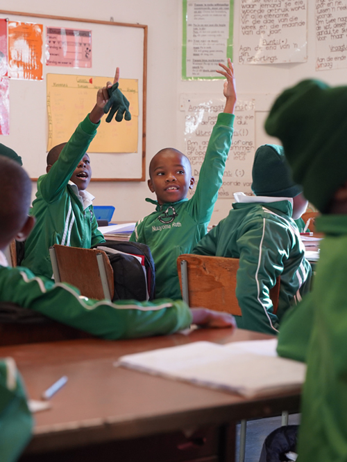 Otjikondo school classroom hands up